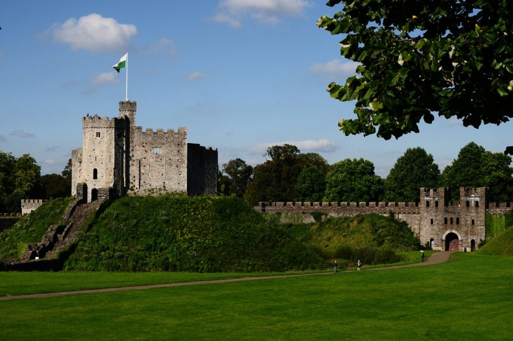 Cardiff Castle keep and curtain wall seen across the green
